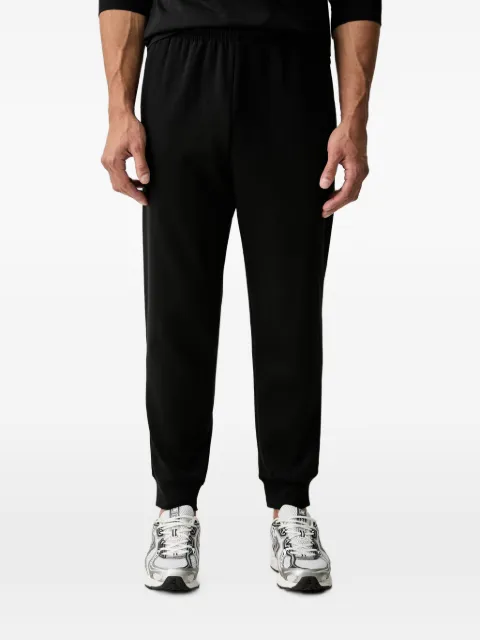 The North Face logo-embroidered track pants Black NF0A8CWY